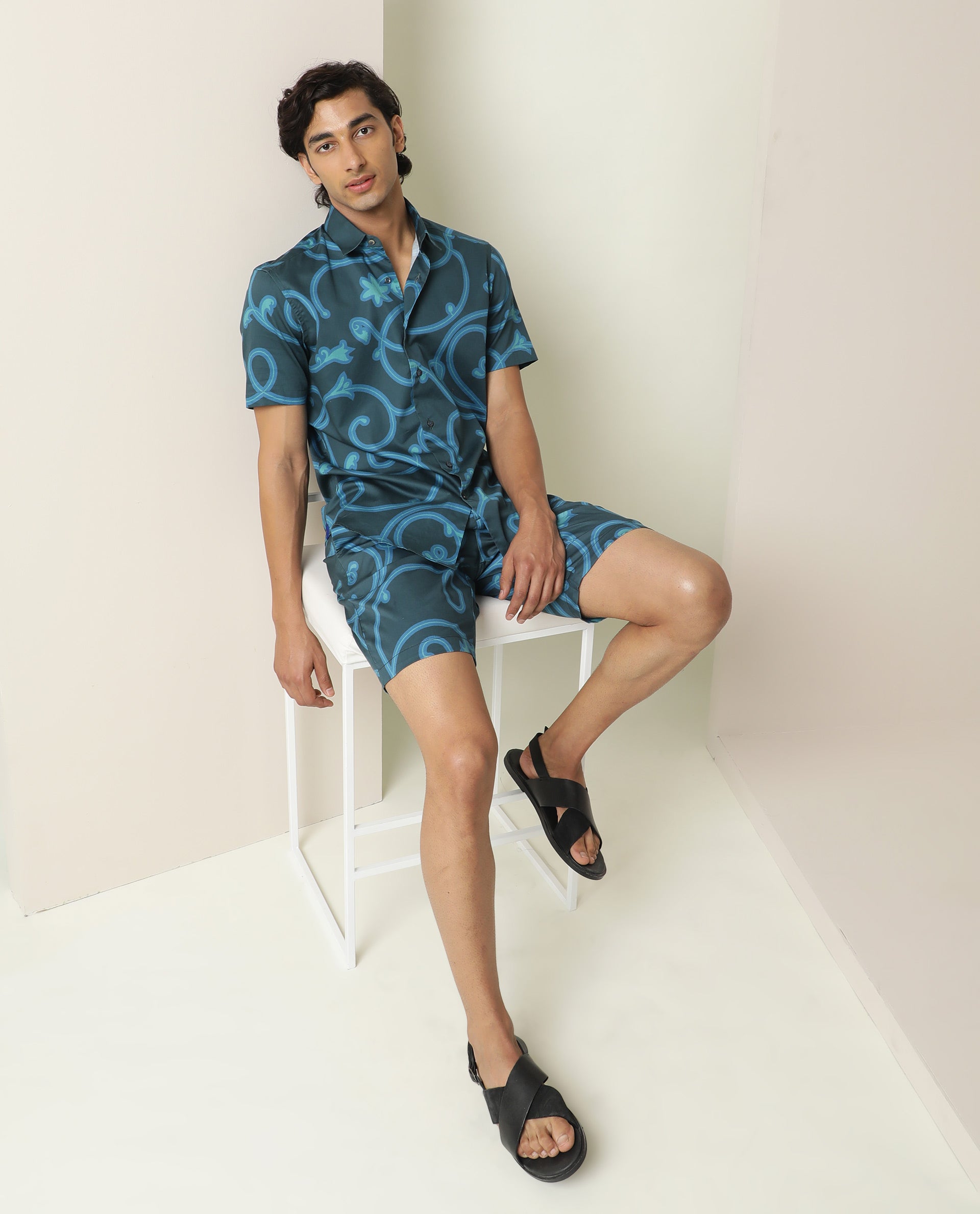 Rare Rabbit Mens Monlet Petrol Cotton Fabric Button & Zip Closure Regular Fit Mid Rise Abstract Print Shorts