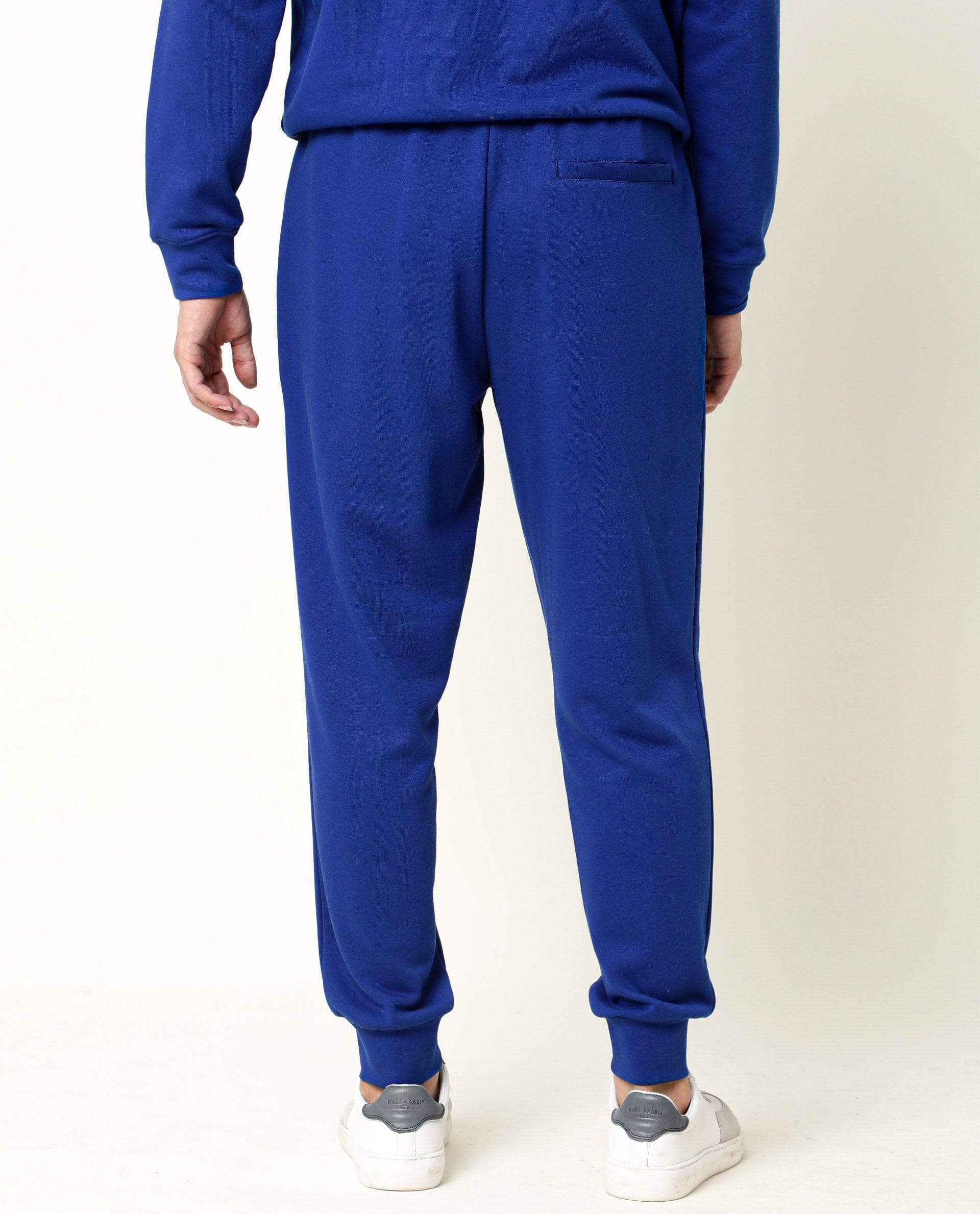 Rare Rabbit Men's Titan Fluorescent Blue Cotton Polyester Fabric Drawstring Slim Fit Track Pant