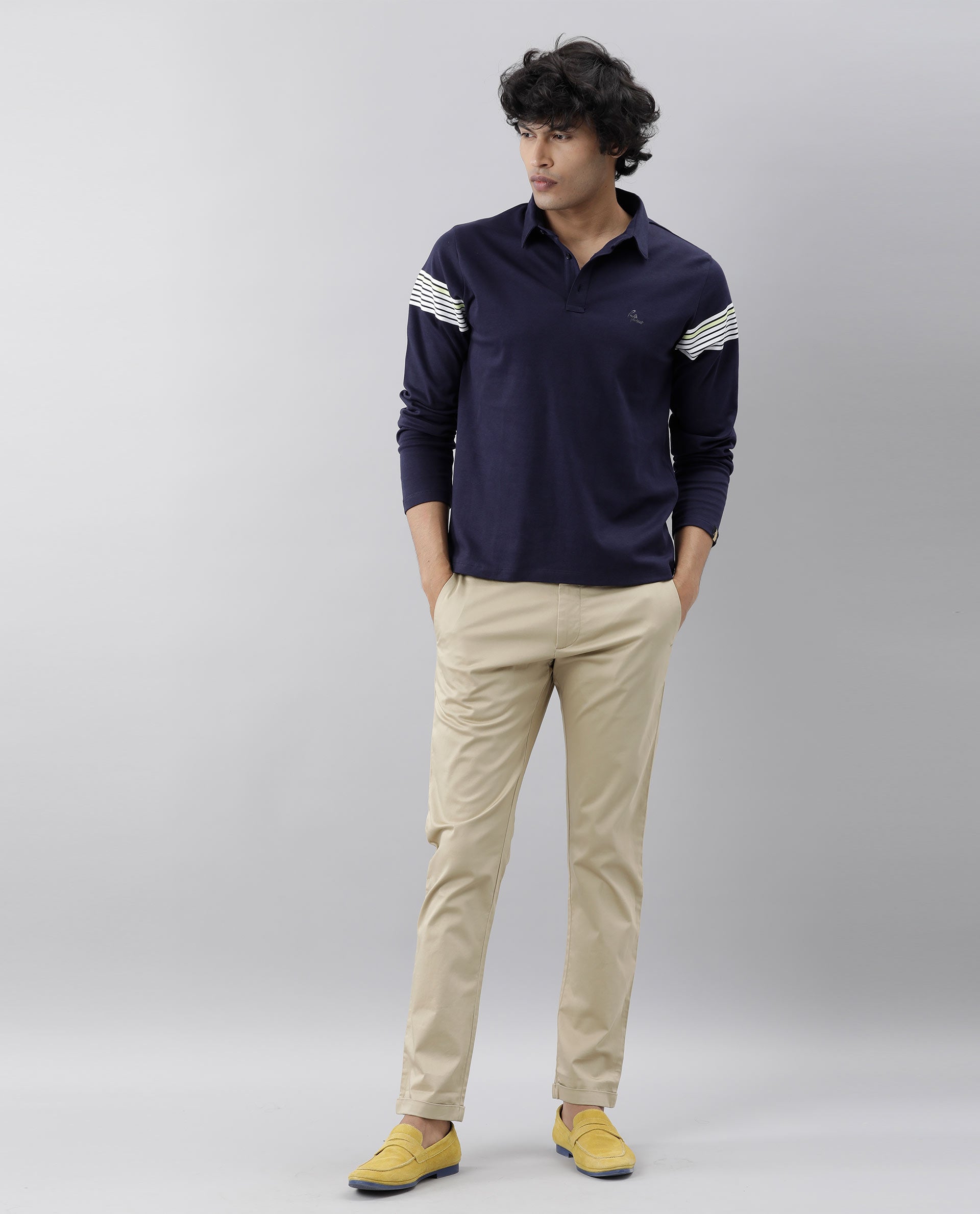 Rare Rabbit Men's Shines Beige Solid Mid-Rise Regular Fit Stretch Trousers